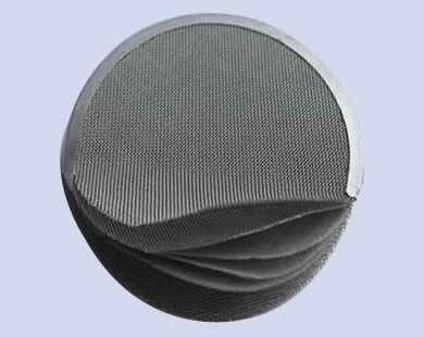 Um disco de aço inoxidável do filtro com seis camadas.